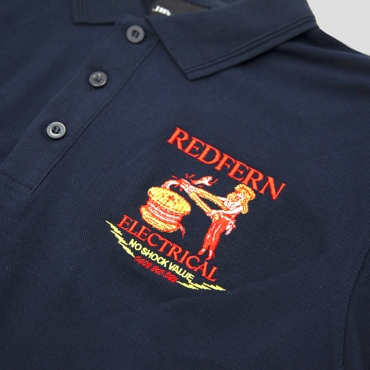 REDFERN ELECTRICAL "NO SHOCK VALUE" POLO NAVY